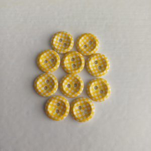 Gele knopen met witte stippen 10 stuks