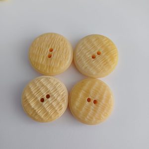 Gele knopen 4 stuks