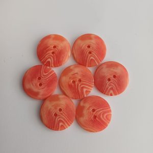 Oranje knopen 7 stuks