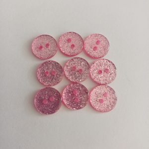 Roze knopen 9 stuks
