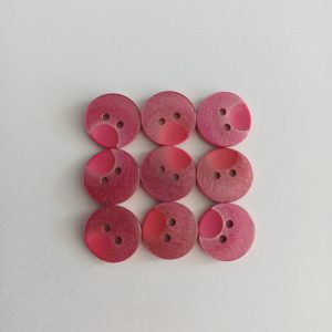 Roze knopen 9 stuks