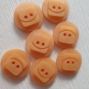 Oranje knopen 7 stuks